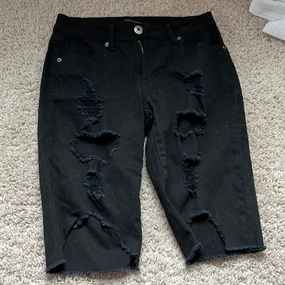 Ripped black shorts